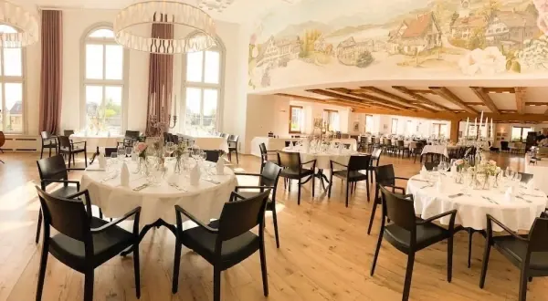 Festively set Löwen hall on the 1st floor